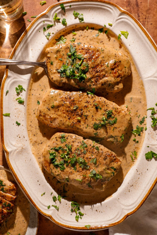 Peppercorn Crusted Pork Chops with Creamy Parmesan Sauce